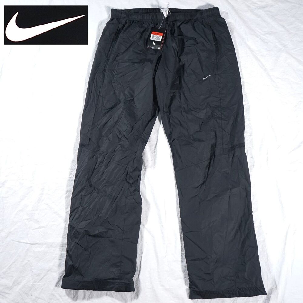 NWT Nike Windbreaker Pants Black Women's Large Ankle Zip 362775-010